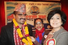Ms. Komal Oli, a member of the Upper House, congratulates Mr. Majgainya on his election within the Rapati Samaj Kathmandu.