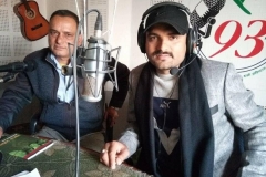 "Shashi Sharma Majgainya is interviewing Lalijan Rawol, a legendary ghazal writer of Nepal, at Gorkha FM, Kathmandu."